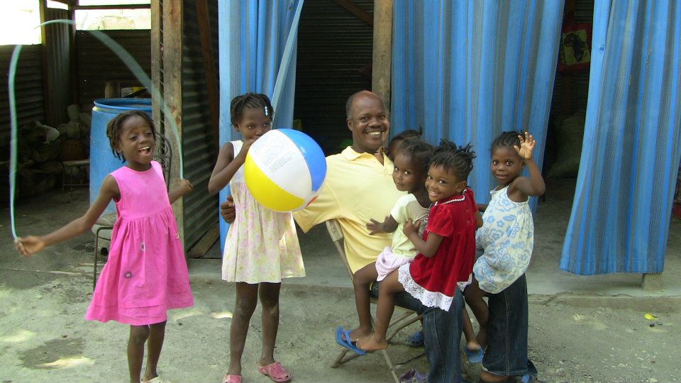 Pastor Bazile and children Pastor Bazile and children